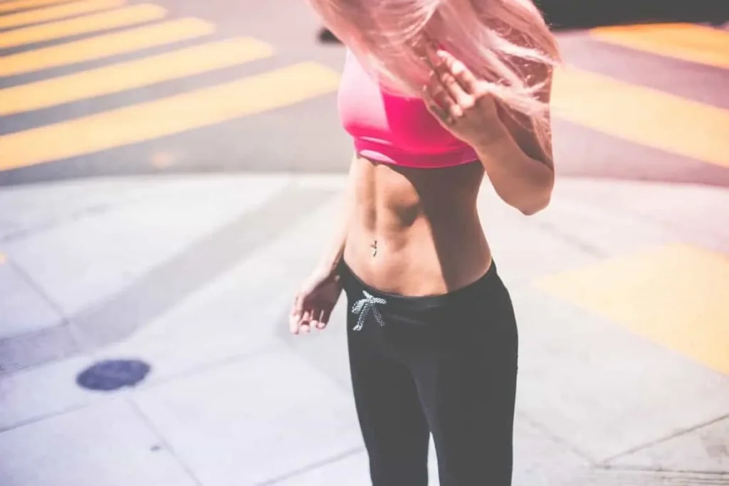 Woman with toned stomach after LA-EMS Body Sculpting Treatment Dunstable